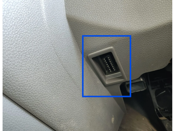 Clip the short section of the harness into place in the vehicle