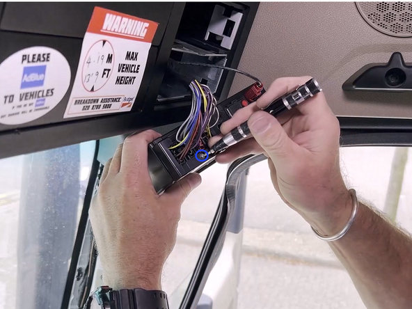 Some tachograph units are protected with a security seal that must be removed to proceed with the installation.