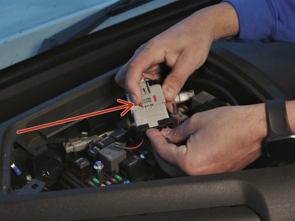 Slide the red TPA lock to secure the connection.