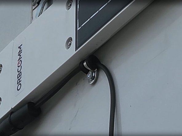 Align the harness with the passthrough hole and secure it using the included P-clamps and screws.