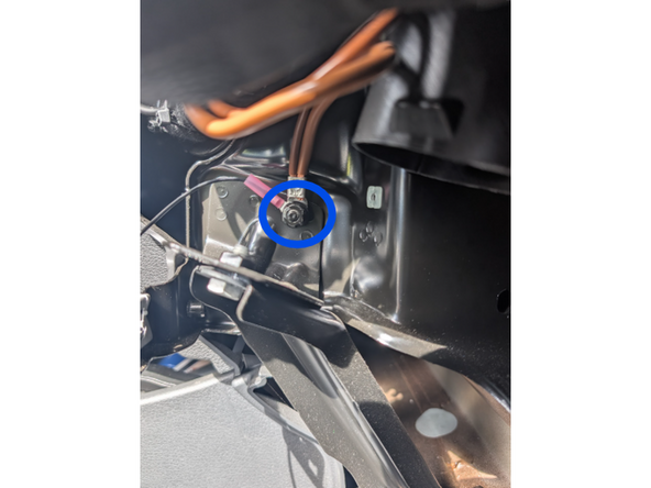 Attach the HRN-CW03K3-A BLACK (ground) wire to the screw shown, using the ring terminal.