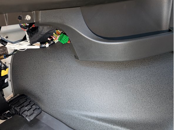 The green FMS connector is clearly visible. Connect the HRN-ES12S1 harness .