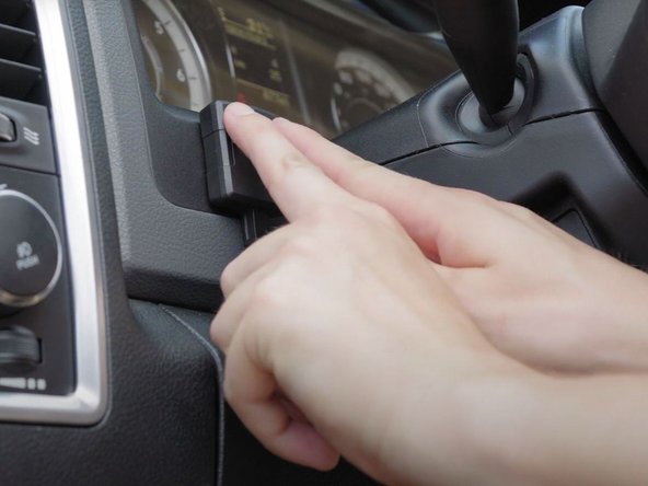 Mount the IOX-BT onto the adhesive tape and firmly hold it in place for 60 seconds.