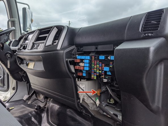 Locate the 8-pin GPS connector at the back left of the fuse box