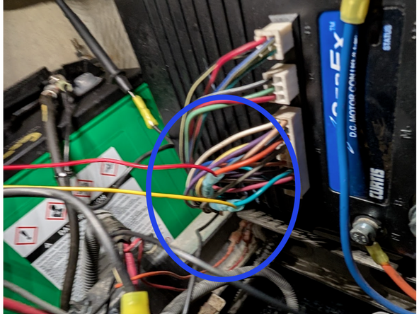 Locate true ignition source on the Green wire from the loomed harness that goes to the controller. Connect yellow wire from the HRN-RW03K4 harness to that Green wire using a heat shrink butt connector.