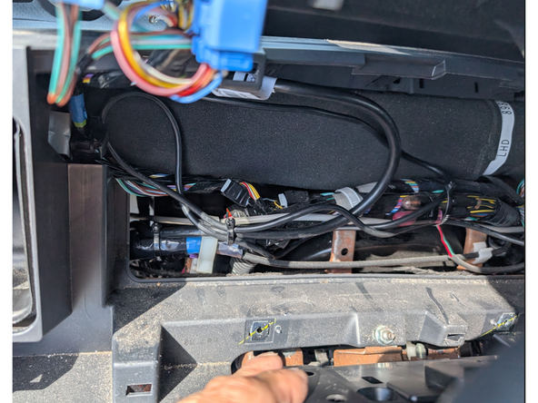 Secure all loose wires behind the cluster.