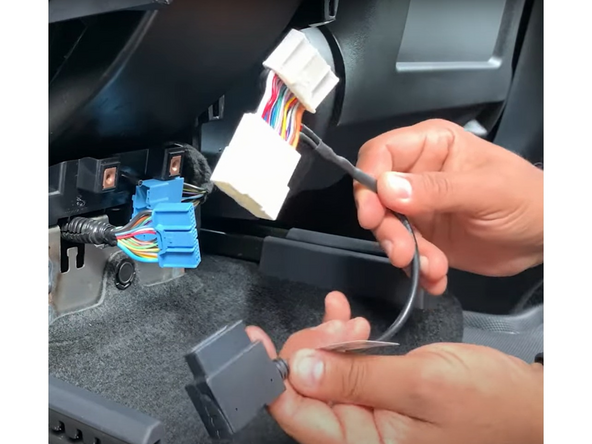! IMPORTANT: Ensure the harness and the Tesla connector are securely attached.