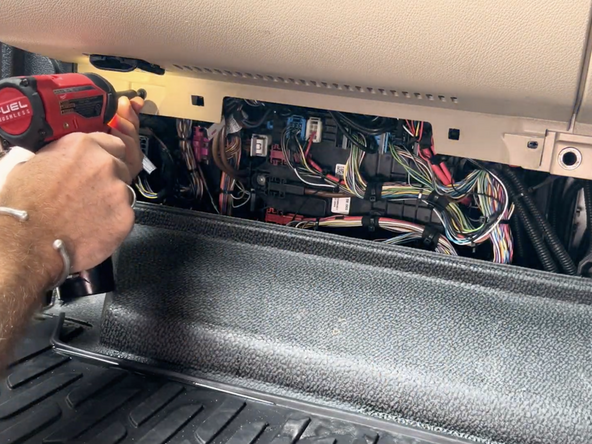 Remove the necessary dash panels in order to access the vehicle’s fuse panel.