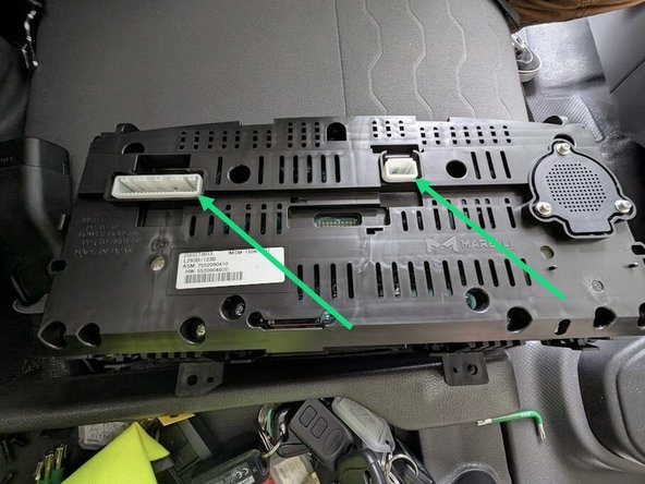 Disconnect the 2 plugs that power the instrument cluster.