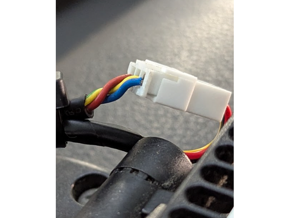 Connect the circular HRN-CCTKCSR connector to the in-cab controller.