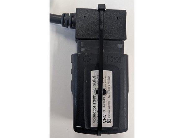 Route the long end of the harness through the dashboard, to the hole where the speaker is located