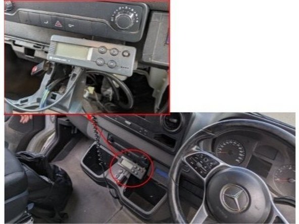 Find the in-cab controller located in the vehicle cabin.