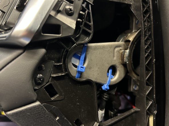 Trim excess cable tie flush.