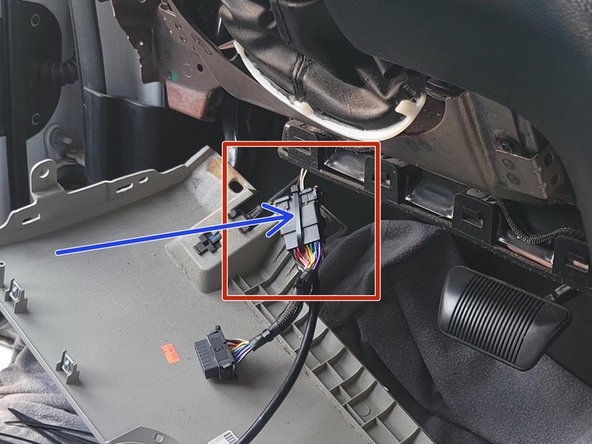 Plug the female connector from the T-harness into the OEM OBDII connector.