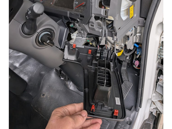 Use panel remove tool to remove ‘clip in’ air vent and switch panel from above the previously removed panel