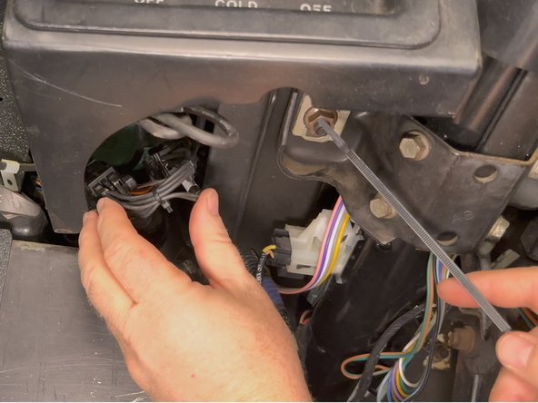 Secure the harness using cable ties to ensure there is no obstruction to the driver, and that the harness does not come into contact with any moving parts.