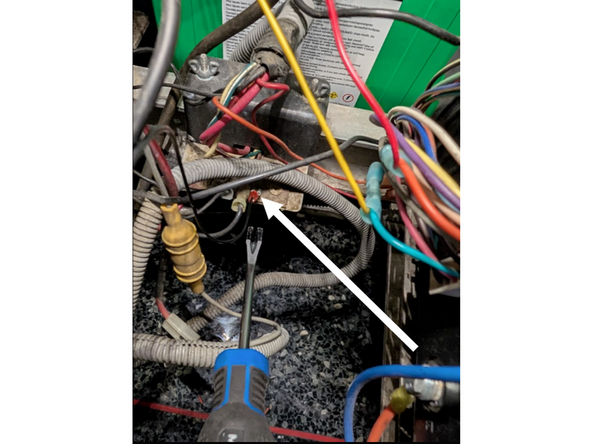 Locate the constant power source Orange wire from the loomed that goes to the controller. Connect Red wire from the HRN-RW03K4 harness to that Orange wire using a heat shrink butt connector.