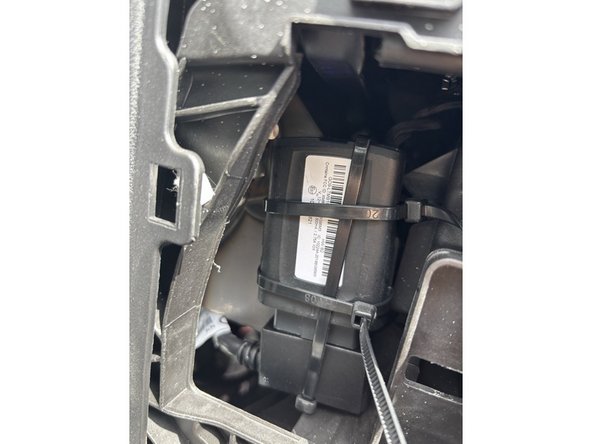 Use zip ties to secure the device and cable bundle to a fixed under-dash bracket or rib.
