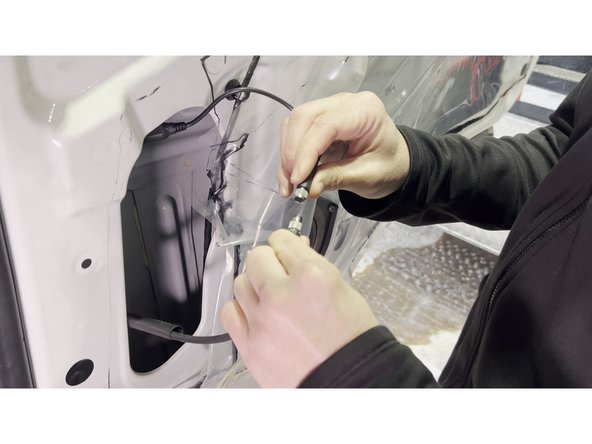 Inside the door cavity, connect the camera coax cable to the extension cable that will run to the GO Focus Pro. Before joining the connectors, apply a small amount of dielectric grease to the male coax pin to prevent corrosion at the connection point.