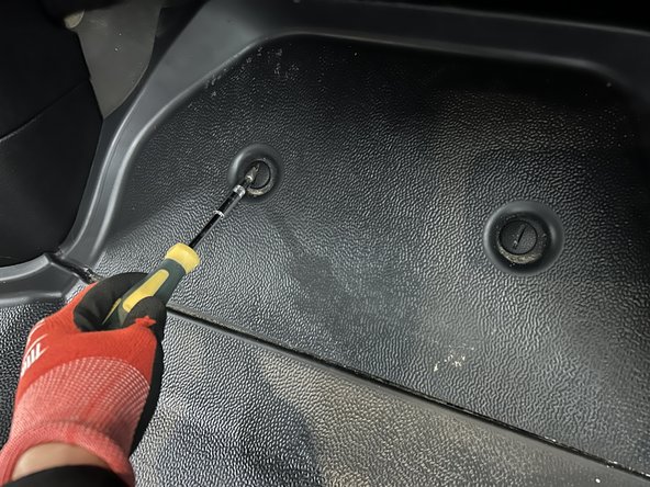 Locate and access the vehicles fuse panel.