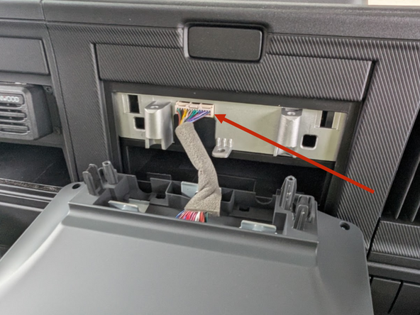 Disconnect display plug from read of unit.