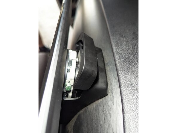 Remove the two Hex nuts using an 8mm spanner.