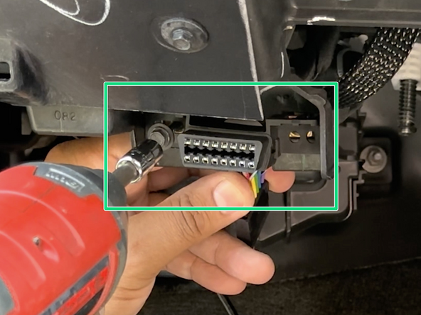Install the prepared T-harness connector and mount it into the factory diagnostic port location.