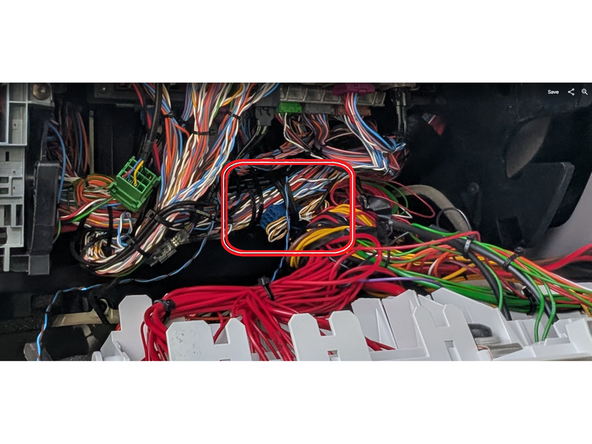 Locate the Yellow and White CAN wires - these are usually taped near a blue connector as shown.