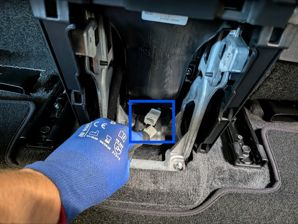 Disconnect the extension connector.