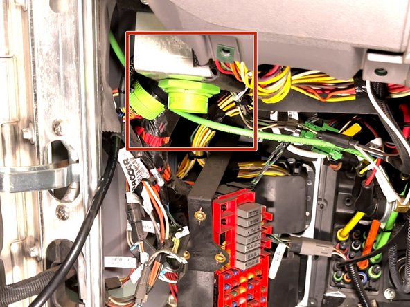 Using the included panel nut  (4N) reinstall the HRN-DM09T2 male harness connector assembly into the same location where the OEM 9 pin was removed.
