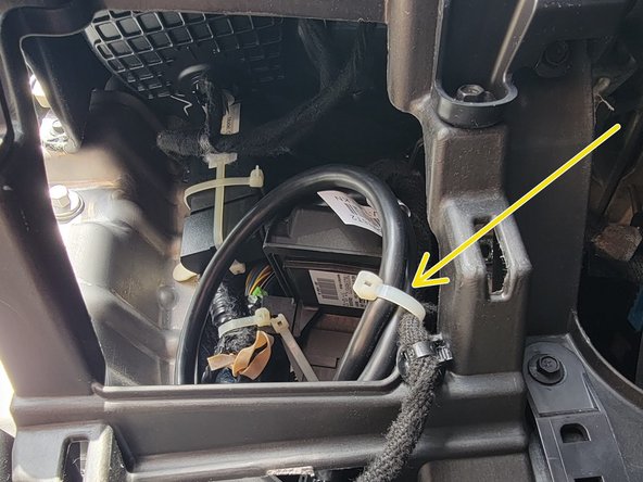 Secure any excess harness as needed