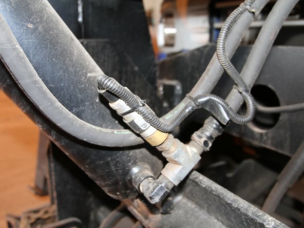 Never ground a sensor outside the cab.  Always run both wires into the cab and protect the wires with loom.