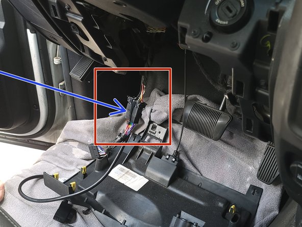 Plug the female connector from the T-harness into the OEM OBDII connector.