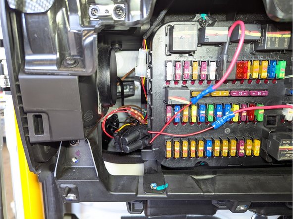 Secure loose cabling with a cable tie and replace all panels, connectors, screws, and clips in the reverse order they were removed.