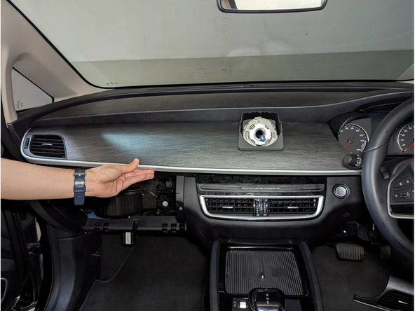 Remove the front panel using a flat-bladed screwdriver or plastic pry tool.
