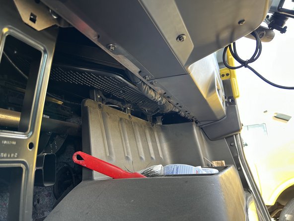 Route the HRN-BS16S5 extension harness to the dash bracket on for far right side of the lower dash panel.