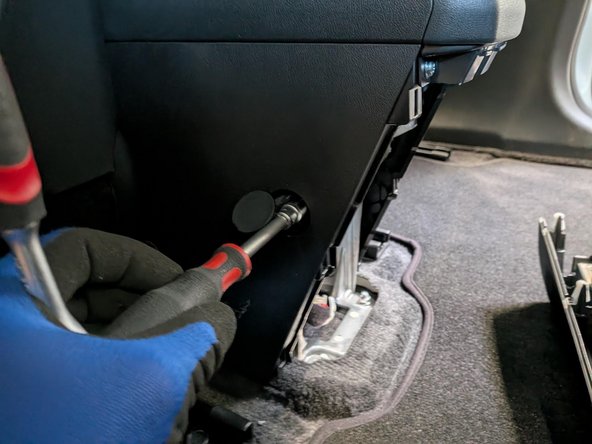 Open the console caps and remove the four bolts.