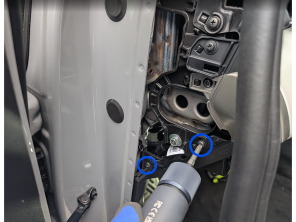 Loosen and extract the screws indicated in the photos with a Phillips Screwdriver .
