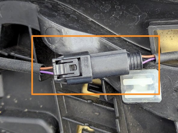 Disconnect the 2-pin connector for the heated seat.
