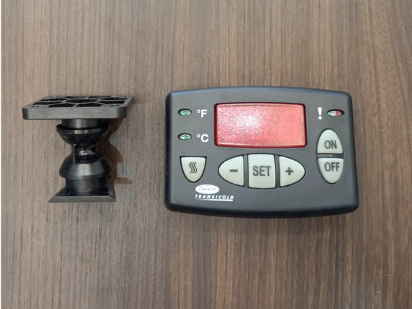 Find the in-cab controller located in the vehicle cabin.