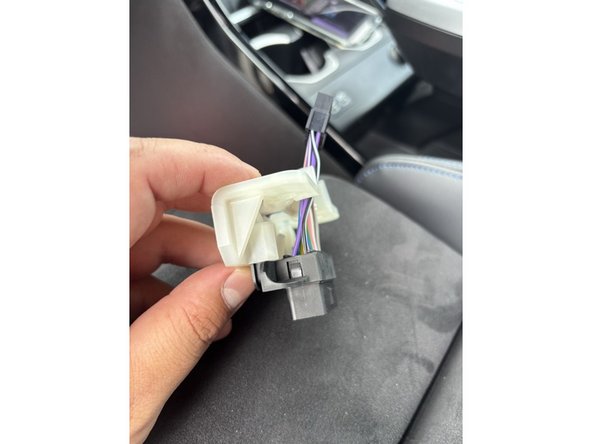 Plug the male end of the Y-harness into the vehicle OBD2 port. Push firmly until you feel a click.