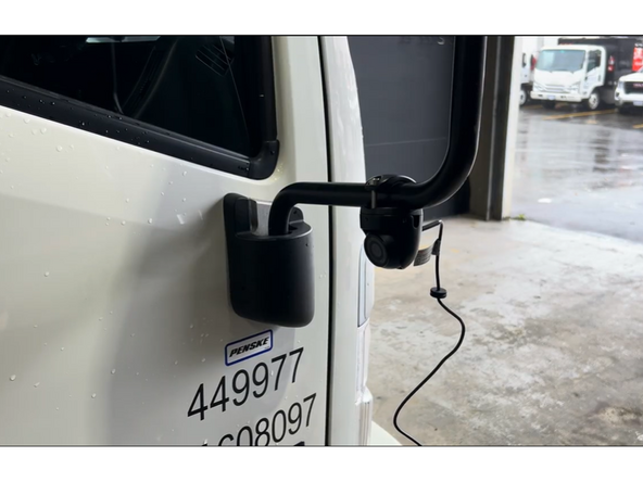 Small Bracket — The most common option. The camera clamps directly onto the existing mirror arm.