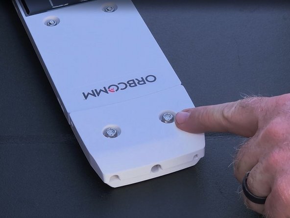 Remove the two 11/32&quot; lock nuts and device harness cover. Set the lock nuts aside for now, as they will need to be reinstalled later.