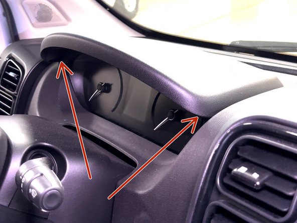 Remove (2) T-25 screws from the instrument panel cover.