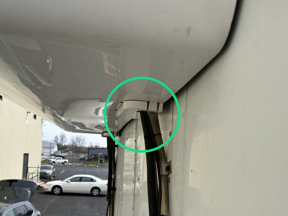 In this example, the connection point for the refrigeration unit controller is located outside of the cab.