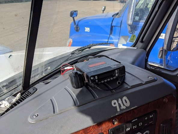 Remove the three T-25 screws holding the fuse box cover in place and then remove the cover.