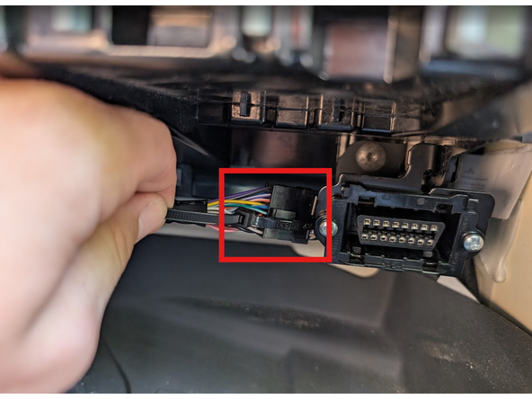 Clip the short section into place on the main harness and secure it with cable ties