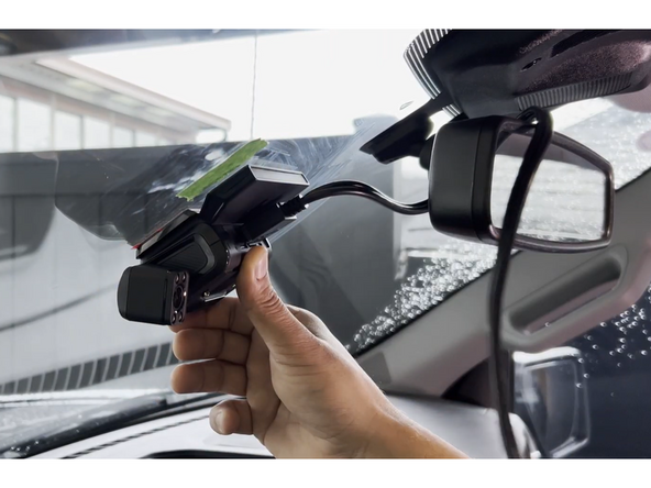 Mark the perimeter of the camera with tape for placement reference.