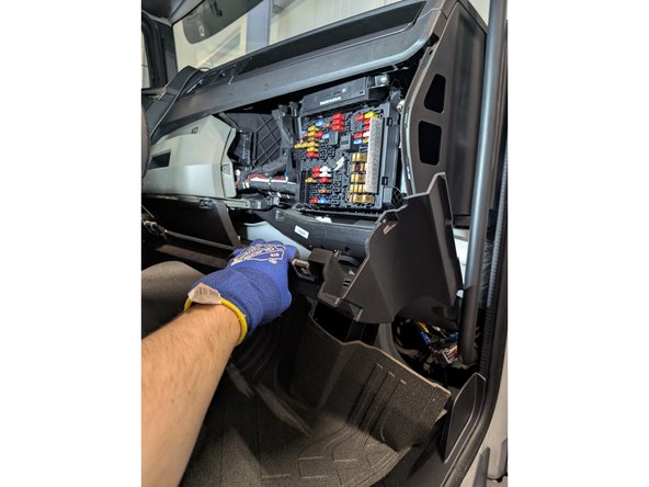Remove the lower interior panel.
