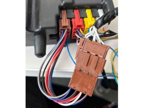 Disconnect the vehicle’s brown connector from port D of the tachograph